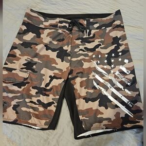 Burnside Camo Board Shorts with White Flag Graphic